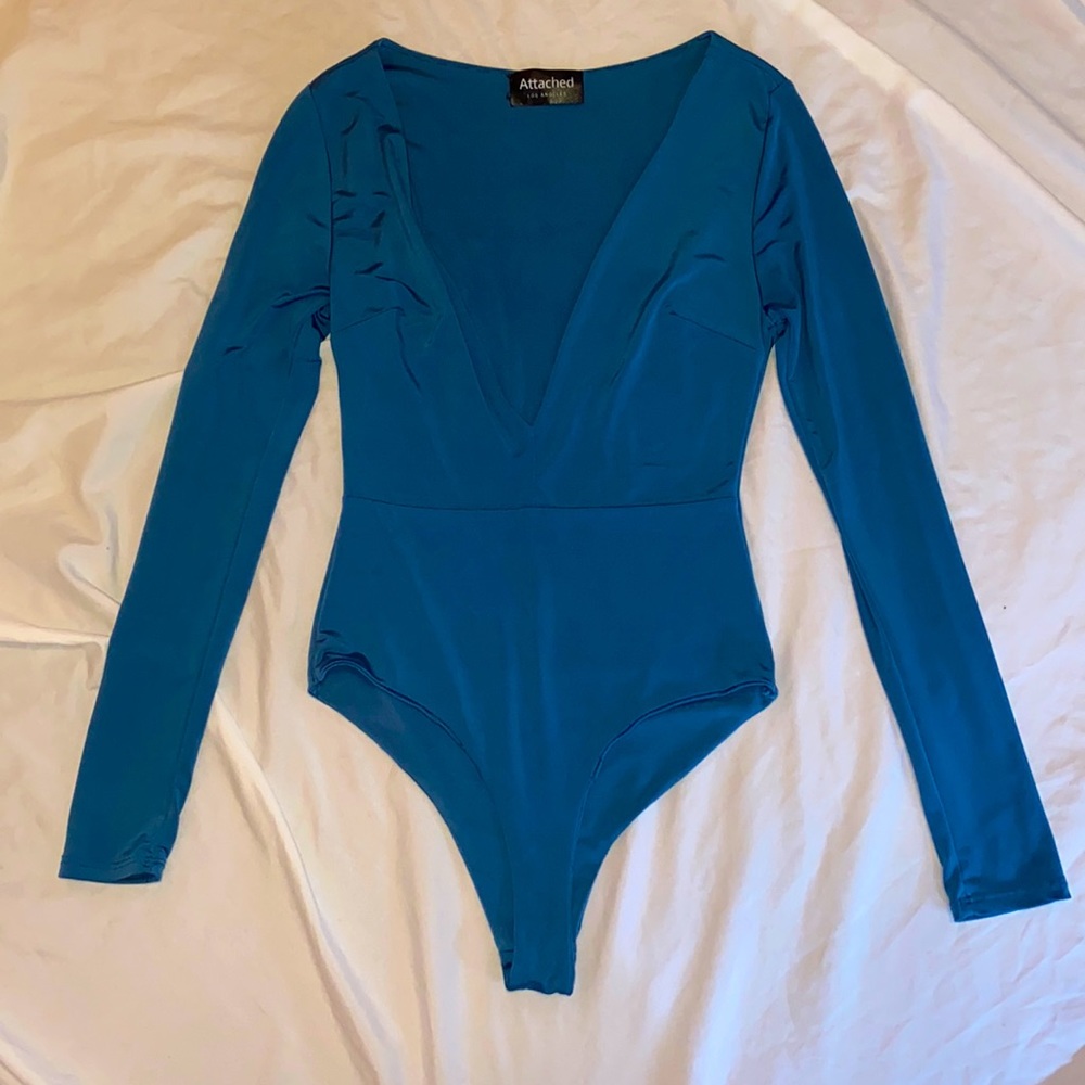 blue bodysuit